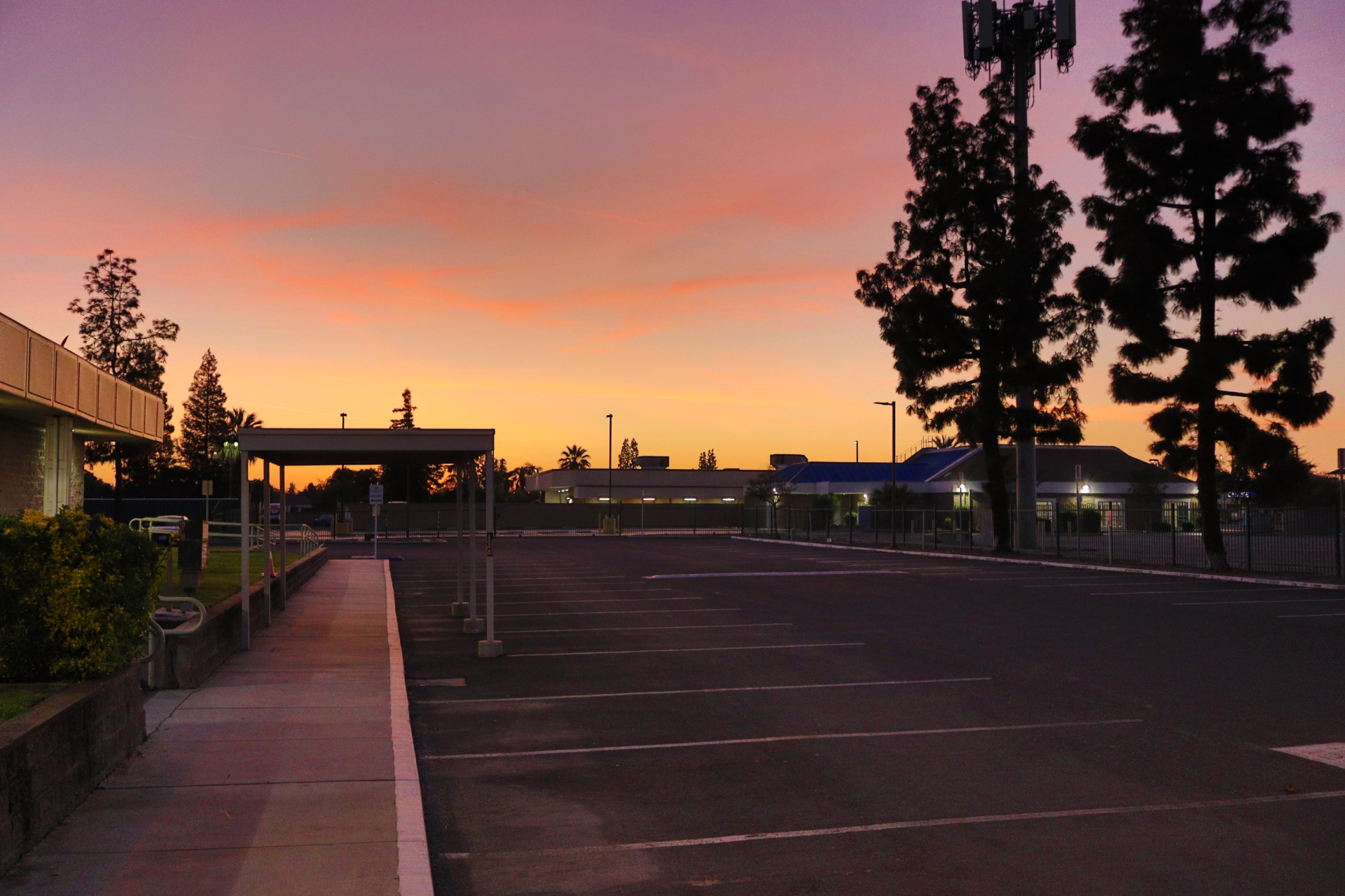 Our Bakersfield dental office and parking lot at sunset